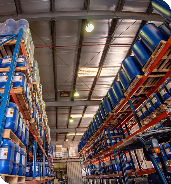 Interior of a warehouse storing essential chemicals used for water treatment processes.